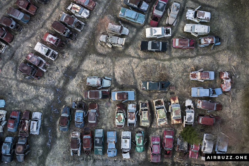 The abandoned cars look like toy cars - Matchbox or Cargo cars.